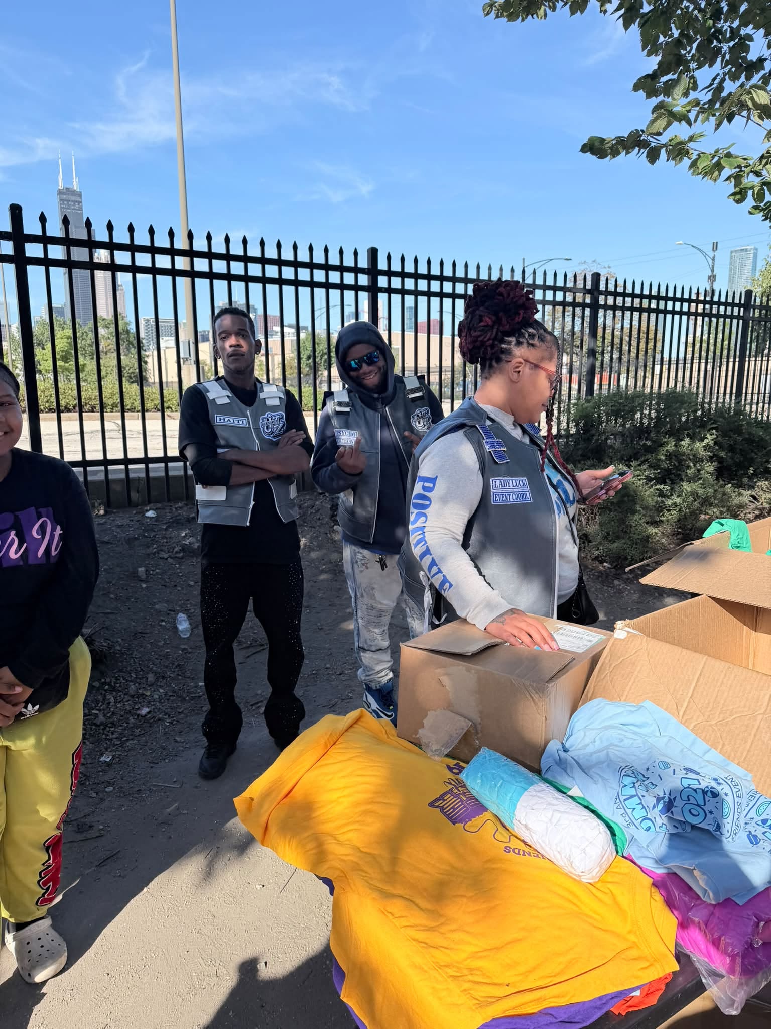 Volunteers handing out clothing and toiletries