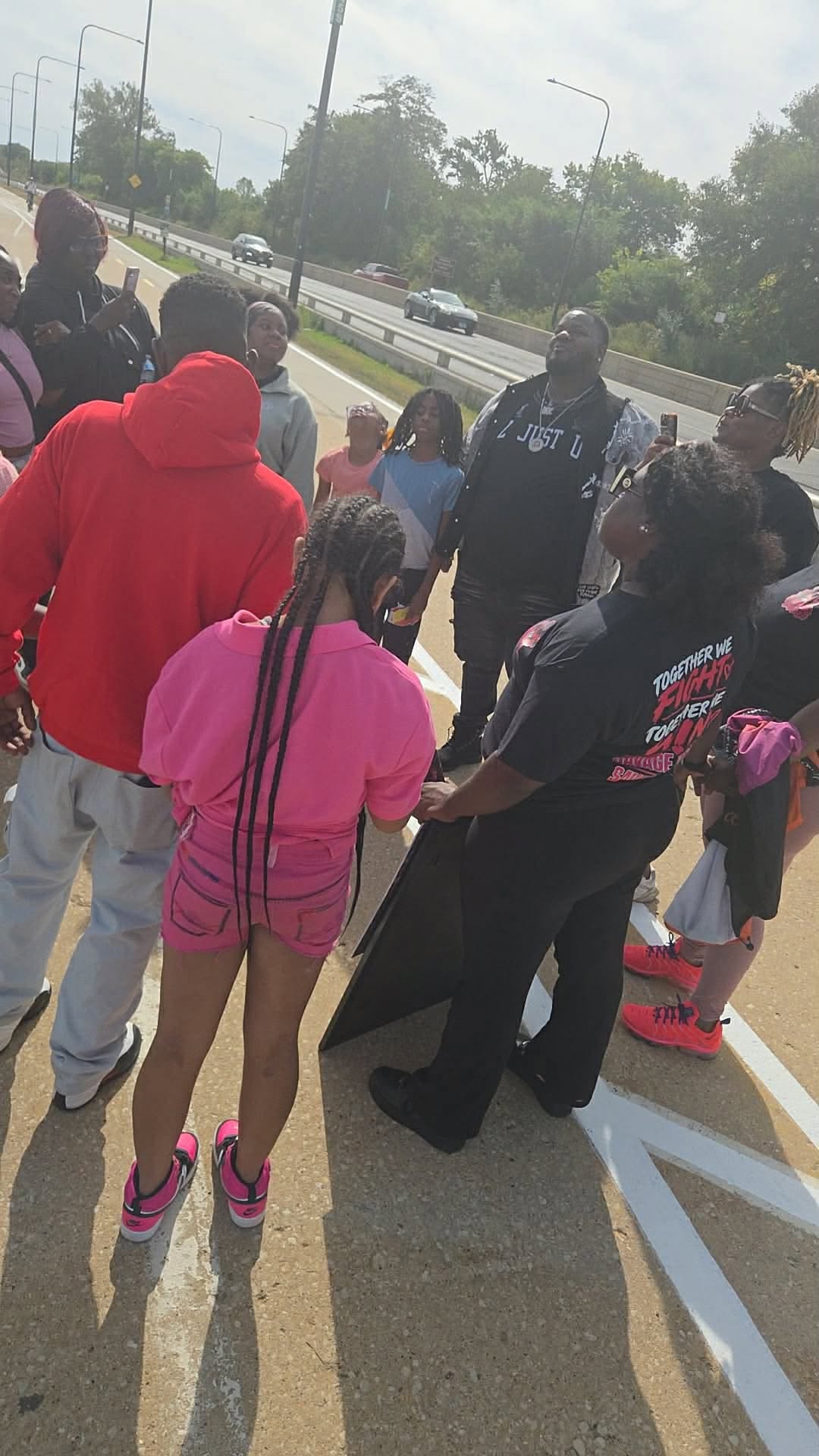 Club founder with a sister club at a breast cancer awareness walk